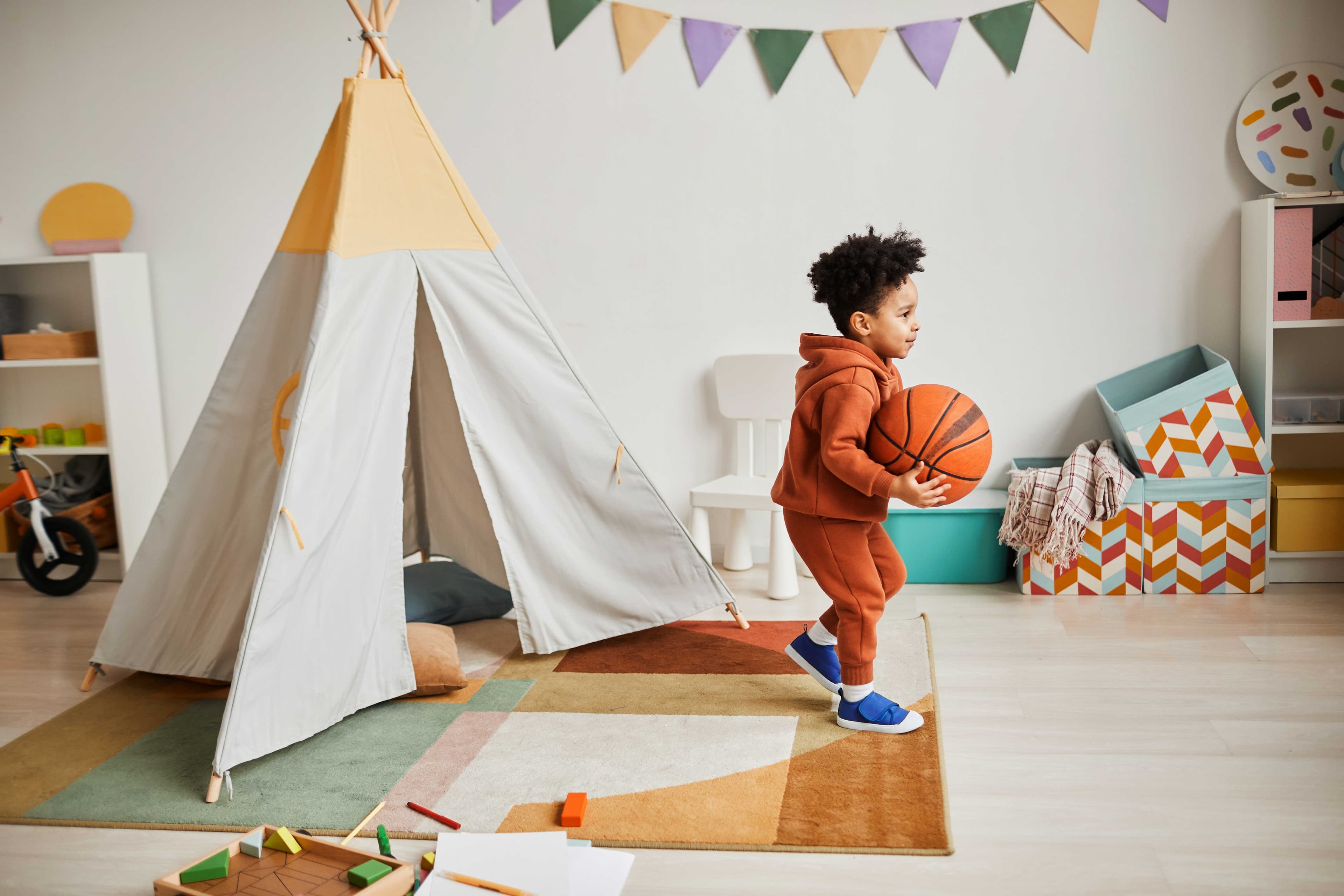 Child Playing In The Kids’ Club for Residents at The Journal