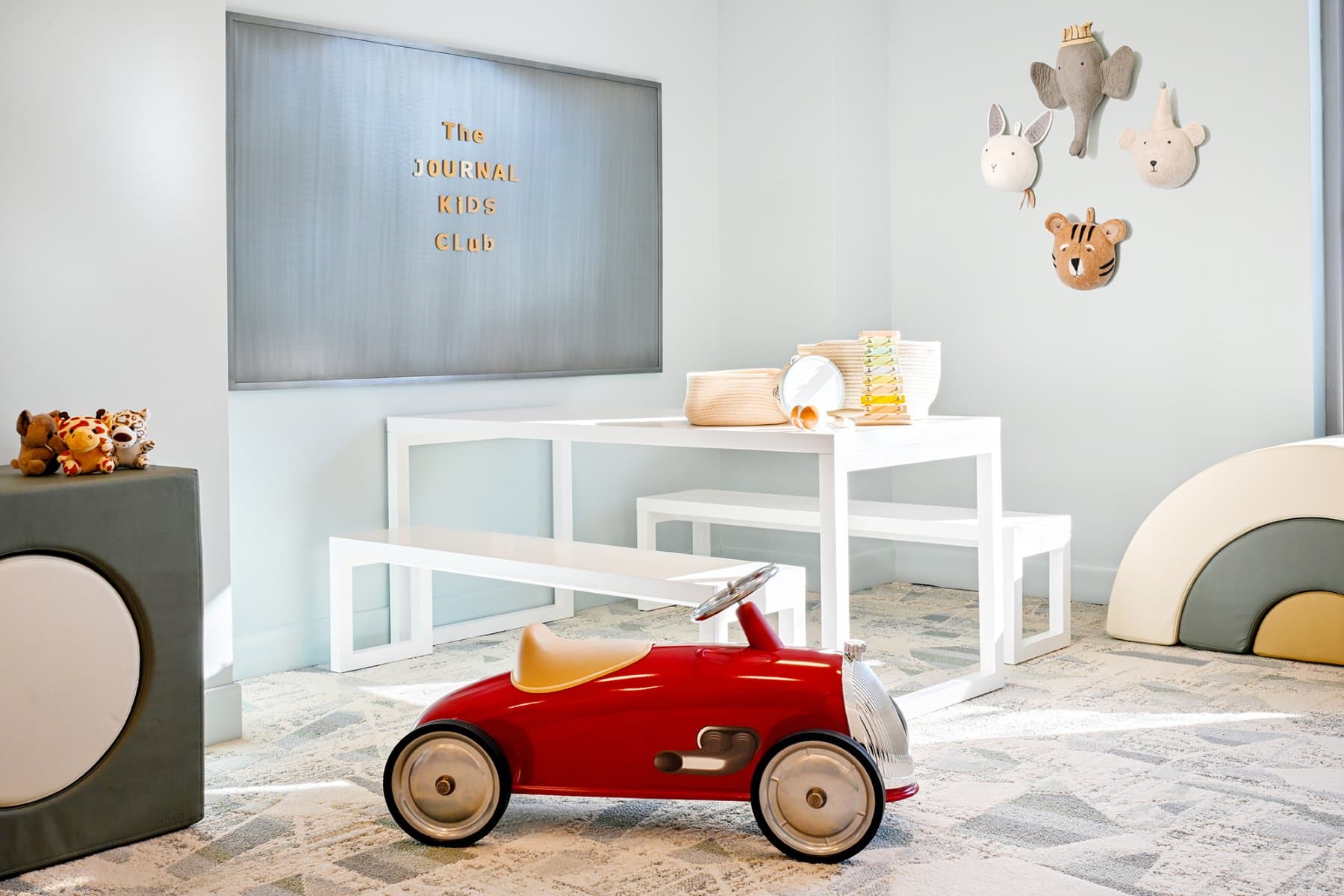 Child Playing In The Kids’ Club for Residents at The Journal