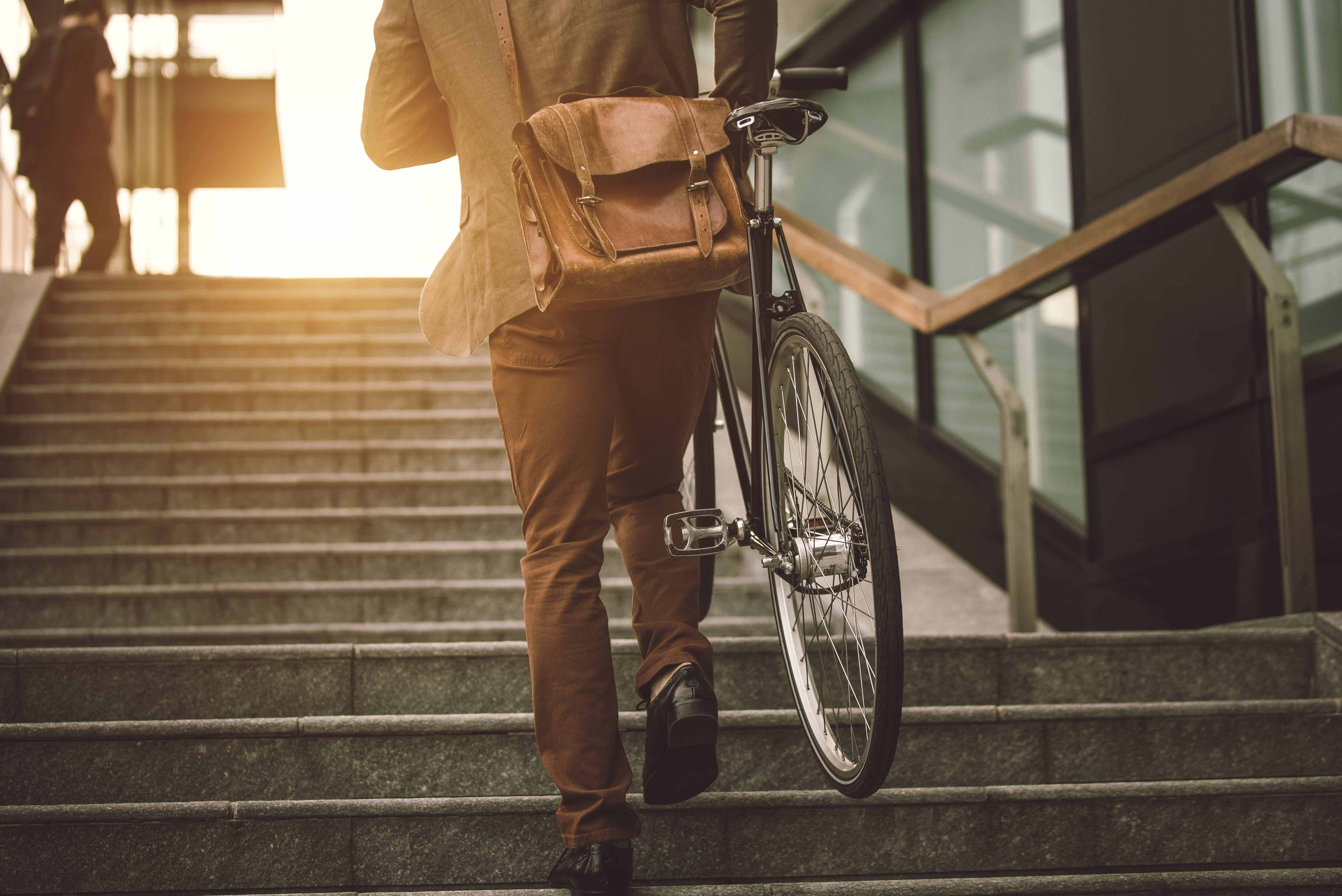 Person carrying bike